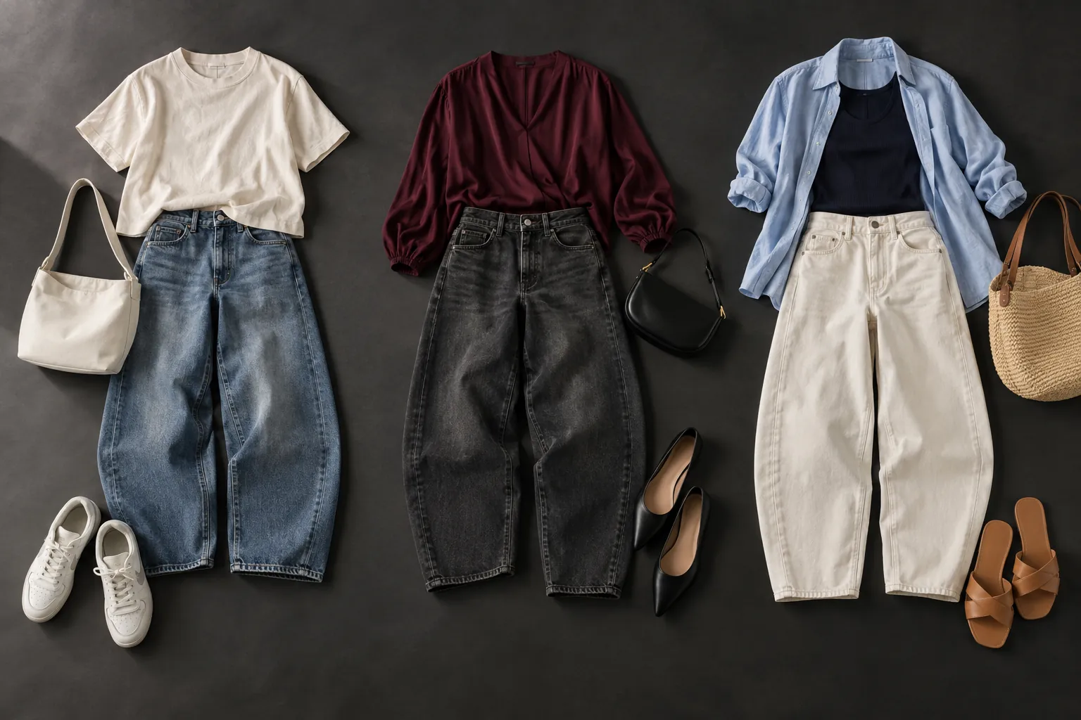 Three barrel-jeans outfits arranged overhead: medium-blue jeans with a cream tee and sneakers, charcoal jeans with a burgundy top and pointed flats, and ecru jeans with a blue open shirt and sandals
